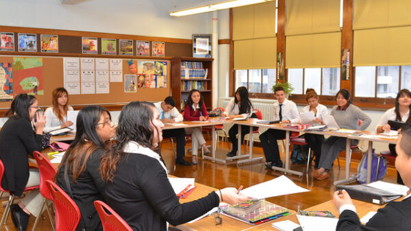 Carmen High School students attend a freshman English class. (Photo by Sue Vliet)